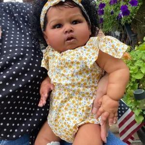Newborn Black Doll  with curls